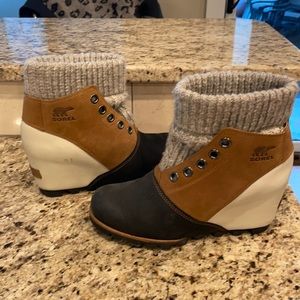 Sorel wedge sweater slip ons, size 8, some wear on tan leather, good condition.